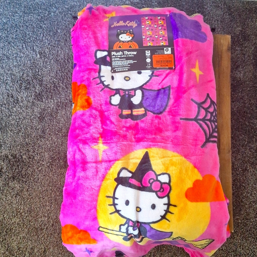 Neon pink hello kitty witch blanket
